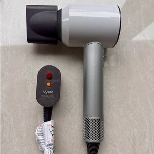 White and Silver Dyson Hair Dryer